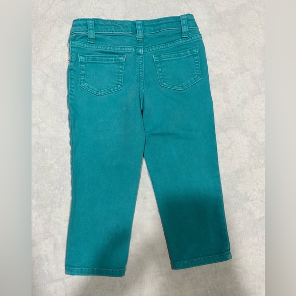 1 Jordache black with flowers jeggings and 1 pair of Cat and Jack teal jeans. - Picture 2 of 6